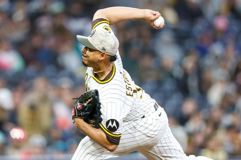 May 17, 2025; San Diego, California, USA; San Diego Padres relief pitcher Jeremiah Estrada (56) throws a pitch during the seventh inning against the Seattle Mariners at Petco Park. Mandatory Credit: David Frerker-Imagn Images