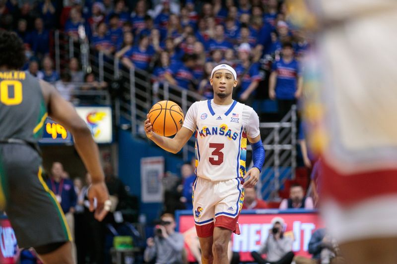 Feb 18, 2023; Lawrence, Kansas, USA; Kansas Jayhawks guard Dajuan Harris Jr. (3) brings the ball up court against the Baylor Bears during the second half at Allen Fieldhouse. Mandatory Credit: William Purnell-USA TODAY Sports