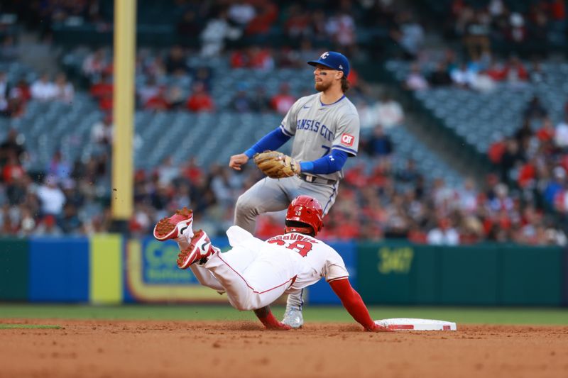 May 10, 2024; Anaheim, California, USA;  Los Angeles Angels third base Niko Goodrum (28) steals second base during the second inning against the Kansas City Royals at Angel Stadium. Mandatory Credit: Kiyoshi Mio-USA TODAY Sports