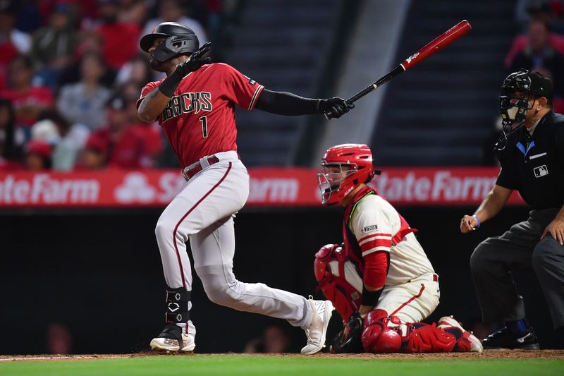 Jul 1, 2023; Anaheim, California, USA; Arizona Diamondbacks designated hitter Kyle Lewis (1) hits a single against the Los Angeles Angels during the fifth inning at Angel Stadium. Mandatory Credit: Gary A. Vasquez-USA TODAY Sports