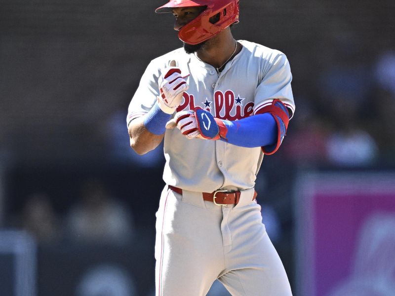 Apr 28, 2024; San Diego, California, USA; Philadelphia Phillies center fielder Johan Rojas (18) celebrates after hitting an RBI double against the San Diego Padres during the eighth inning at Petco Park. Mandatory Credit: Orlando Ramirez-USA TODAY Sports