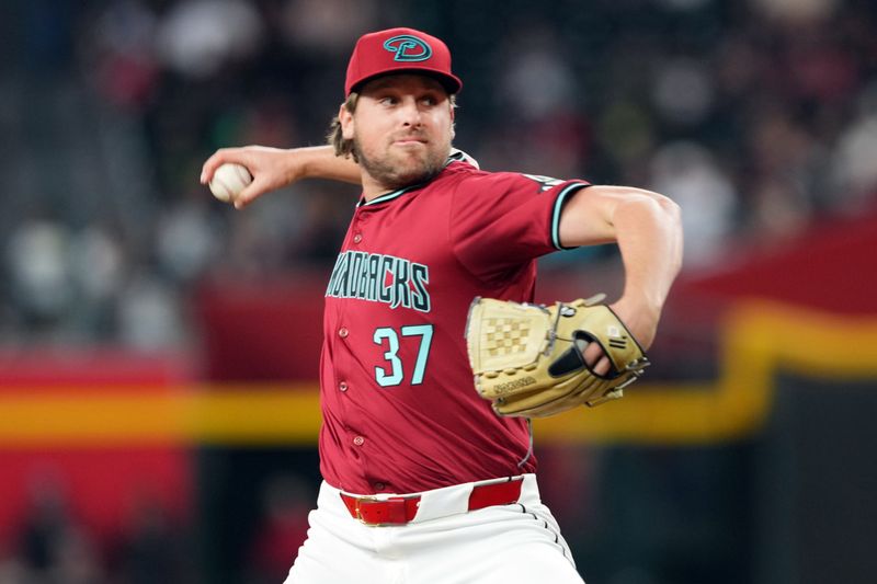 May 5, 2024; Phoenix, Arizona, USA; Arizona Diamondbacks pitcher Kevin Ginkel (37) pitches against the San Diego Padres during the ninth inning at Chase Field. Mandatory Credit: Joe Camporeale-USA TODAY Sports