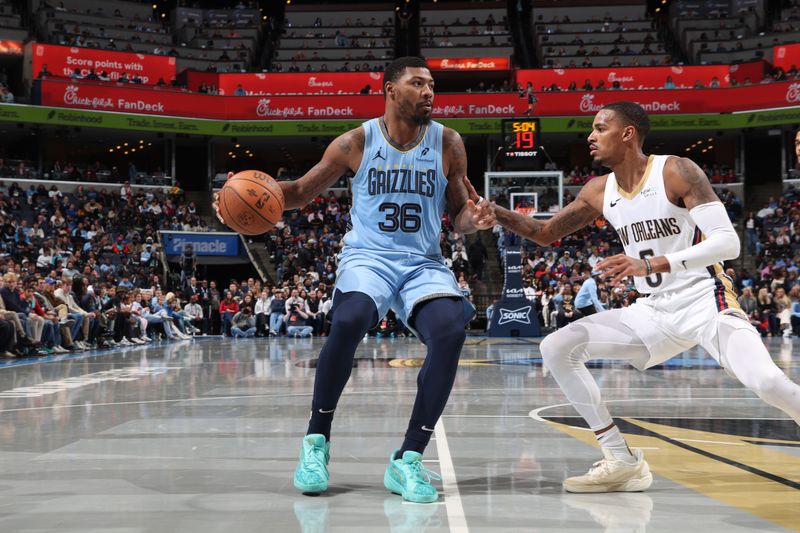 MEMPHIS, TN - NOVEMBER 29: Marcus Smart #36 of the Memphis Grizzlies handles the ball during the game against the New Orleans Pelicans during the Emirates NBA Cup game on November 29, 2024 at FedExForum in Memphis, Tennessee. NOTE TO USER: User expressly acknowledges and agrees that, by downloading and or using this photograph, User is consenting to the terms and conditions of the Getty Images License Agreement. Mandatory Copyright Notice: Copyright 2024 NBAE (Photo by Joe Murphy/NBAE via Getty Images)