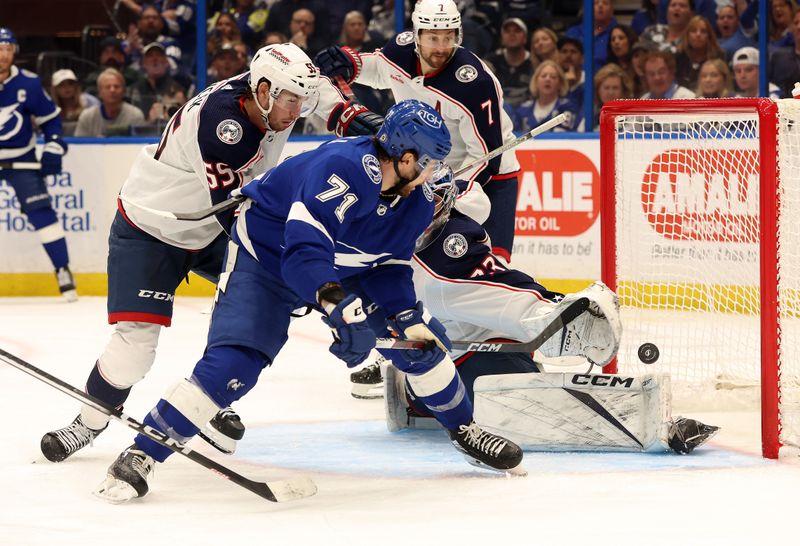 Apr 9, 2024; Tampa, Florida, USA; Tampa Bay Lightning center Anthony Cirelli (71) shoots and scores a goal on Columbus Blue Jackets goaltender Jet Greaves (73) during the third period at Amalie Arena. Mandatory Credit: Kim Klement Neitzel-USA TODAY Sports