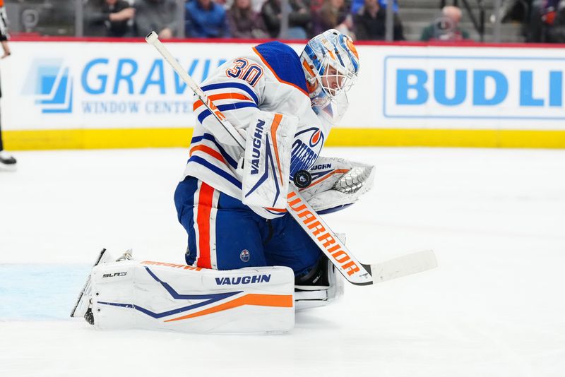 Apr 18, 2024; Denver, Colorado, USA; Edmonton Oilers goaltender Calvin Pickard (30) makes a save in the second period against the Colorado Avalanche at Ball Arena. Mandatory Credit: Ron Chenoy-USA TODAY Sports