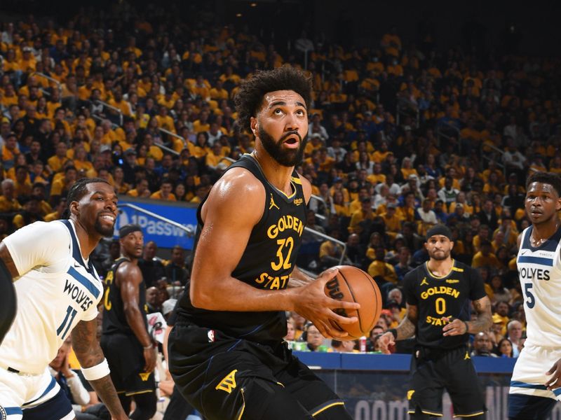SAN FRANCISCO, CA - MAY 12: Trayce Jackson-Davis #32 of the Golden State Warriors drives to the basket during the game against the Minnesota Timberwolves during Round Two Game Four of the 2025 NBA Playoffs on MAY 12, 2025 at Chase Center in San Francisco, California. NOTE TO USER: User expressly acknowledges and agrees that, by downloading and or using this photograph, user is consenting to the terms and conditions of Getty Images License Agreement. Mandatory Copyright Notice: Copyright 2025 NBAE (Photo by Noah Graham/NBAE via Getty Images)