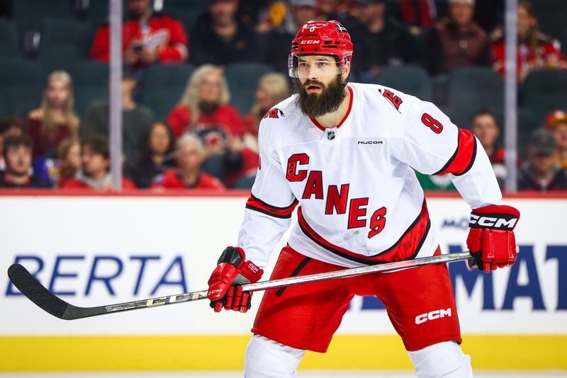 Oct 24, 2024; Calgary, Alberta, CAN; Carolina Hurricanes defenseman Brent Burns (8) during the face off against the Calgary Flames during the first period at Scotiabank Saddledome. Mandatory Credit: Sergei Belski-Imagn Images