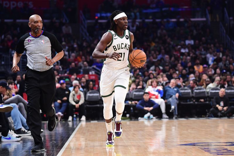 LOS ANGELES, CA - FEBRUARY 10: Jrue Holiday #21 of the Milwaukee Bucks drives to the basket during the game against the LA Clippers on February 10, 2023 at Crypto.Com Arena in Los Angeles, California. NOTE TO USER: User expressly acknowledges and agrees that, by downloading and/or using this Photograph, user is consenting to the terms and conditions of the Getty Images License Agreement. Mandatory Copyright Notice: Copyright 2023 NBAE (Photo by Adam Pantozzi/NBAE via Getty Images)