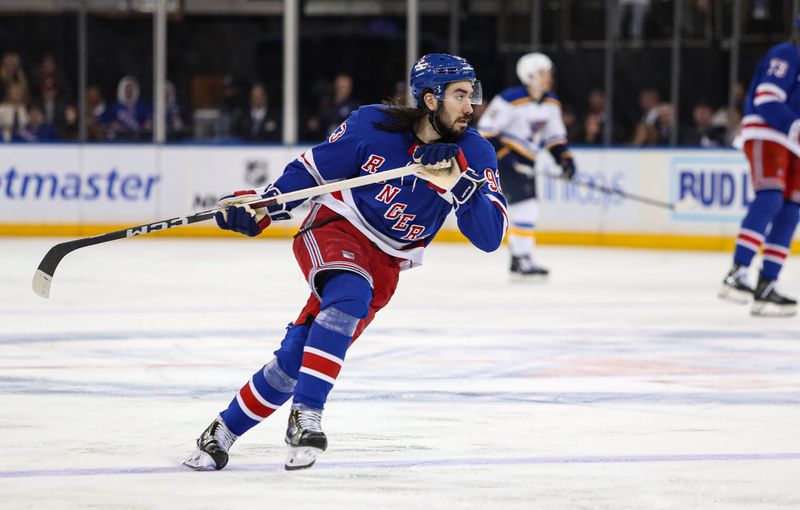 Nov 25, 2024; New York, New York, USA; New York Rangers center Mika Zibanejad (93) skates against the St. Louis Blues during the third period at Madison Square Garden. Mandatory Credit: Danny Wild-Imagn Images