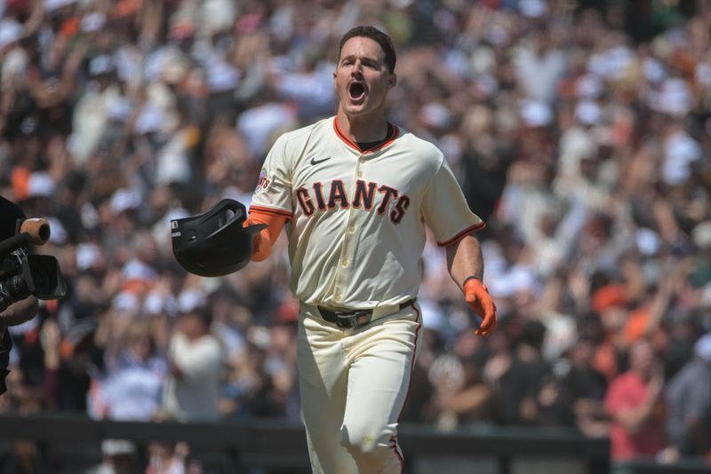 Jun 7, 2025; San Francisco, California, USA;  San Francisco Giants third baseman Matt Chapman (26) celebrates after hitting a walk off home run against the Atlanta Braves during the ninth inning at Oracle Park. Mandatory Credit: Ed Szczepanski-Imagn Images