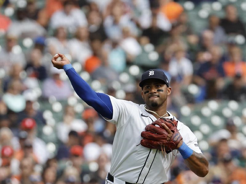 Sep 26, 2024; Detroit, Michigan, USA;  Detroit Tigers third baseman Andy Ibanez (77) makes a throw in the fifth inning against the Tampa Bay Rays at Comerica Park. Mandatory Credit: Rick Osentoski-Imagn Images