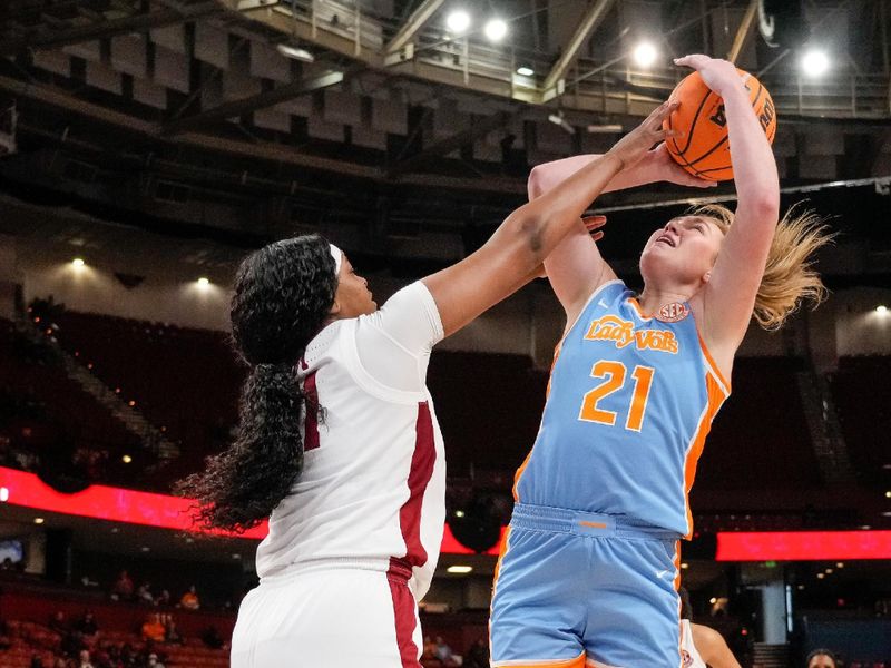 Mar 8, 2024; Greensville, SC, USA; Tennessee Lady Vols guard Tess Darby (21) shoots against Alabama Crimson Tide forward Essence Cody (21) during the second half at Bon Secours Wellness Arena. Mandatory Credit: Jim Dedmon-USA TODAY Sports