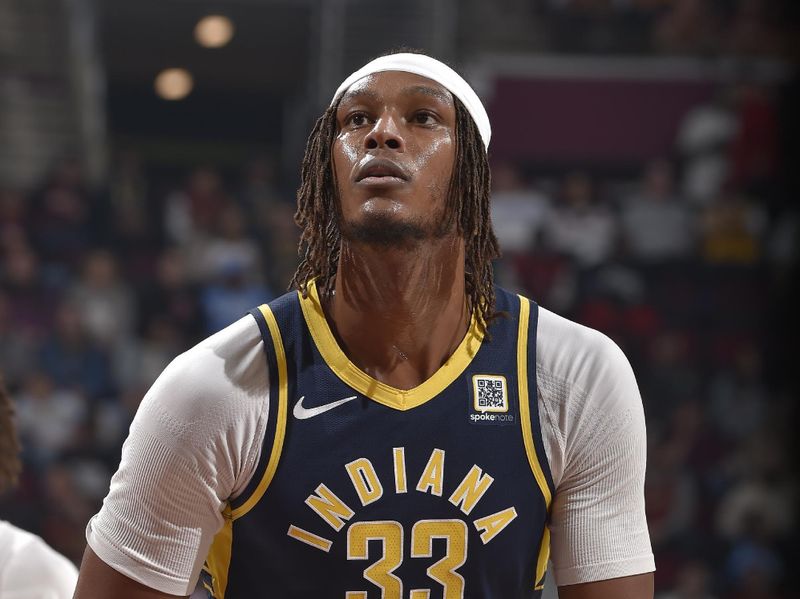 CLEVELAND, OH - APRIL 13: Myles Turner #33 of the Indiana Pacers shoots a free throw during the game against the Cleveland Cavaliers on April 13, 2025 at Rocket Arena in Cleveland, Ohio. NOTE TO USER: User expressly acknowledges and agrees that, by downloading and/or using this Photograph, user is consenting to the terms and conditions of the Getty Images License Agreement. Mandatory Copyright Notice: Copyright 2025 NBAE (Photo by David Liam Kyle/NBAE via Getty Images)