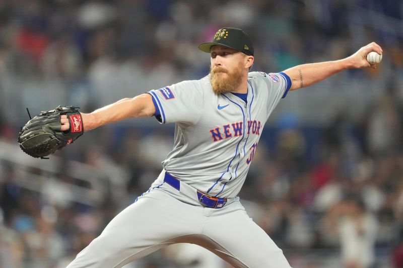 May 19, 2024; Miami, Florida, USA;  New York Mets pitcher Jake Diekman (30) pitches in the seventh inning against the Miami Marlins at loanDepot Park. Mandatory Credit: Jim Rassol-USA TODAY Sports