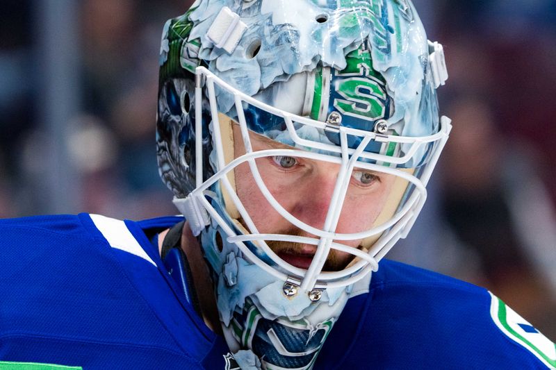 Jan 16, 2025; Vancouver, British Columbia, CAN; Vancouver Canucks goalie Thatcher Demko (35) during a stop in play against the Los Angeles Kings in the first period at Rogers Arena. Mandatory Credit: Bob Frid-Imagn Images