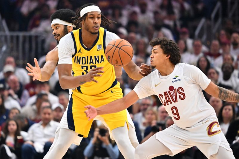CLEVELAND, OHIO - MAY 06: Craig Porter Jr. #9 of the Cleveland Cavaliers knocks the ball away from Myles Turner #33 of the Indiana Pacers during the second quarter of game two of the Eastern Conference Semifinals at Rocket Arena on May 06, 2025 in Cleveland, Ohio. NOTE TO USER: User expressly acknowledges and agrees that, by downloading and or using this photograph, User is consenting to the terms and conditions of the Getty Images License Agreement. (Photo by Jason Miller/Getty Images)