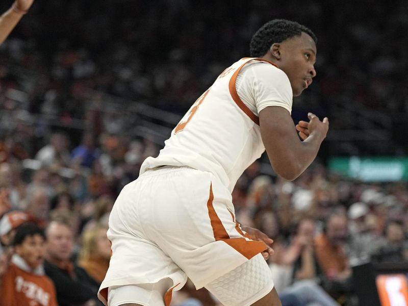 Nov 26, 2023; Austin, Texas, USA; Texas Longhorns guard Max Abmas (3) reacts after scoring a three point basket during the first half against the Wyoming Cowboys at Moody Center. Mandatory Credit: Scott Wachter-USA TODAY Sports