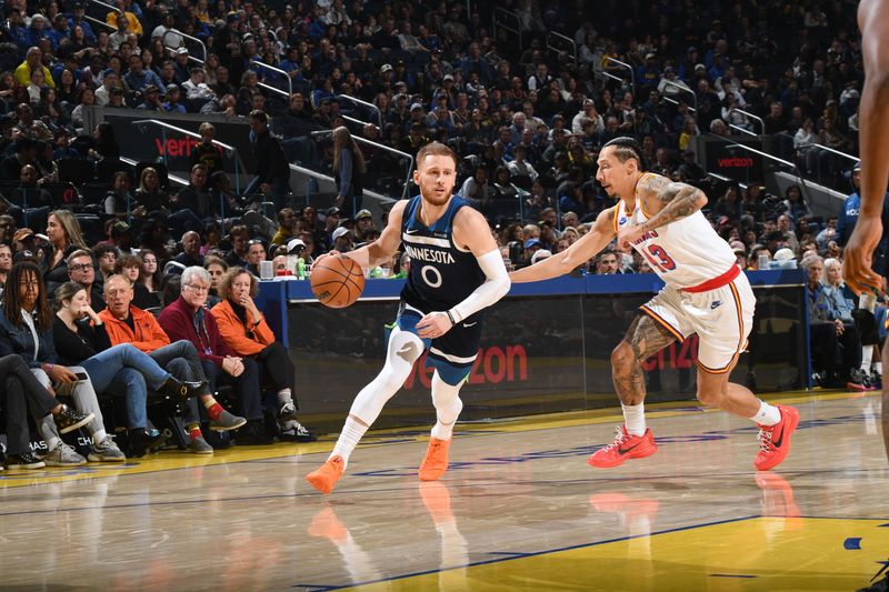 SAN FRANCISCO, CA - DECEMBER 8: Donte DiVincenzo #0 of the Minnesota Timberwolves dribbles the ball during the game against the Golden State Warriors  during a regular season game on December 8, 2024 at Chase Center in San Francisco, California. NOTE TO USER: User expressly acknowledges and agrees that, by downloading and or using this photograph, user is consenting to the terms and conditions of Getty Images License Agreement. Mandatory Copyright Notice: Copyright 2024 NBAE (Photo by Noah Graham/NBAE via Getty Images)