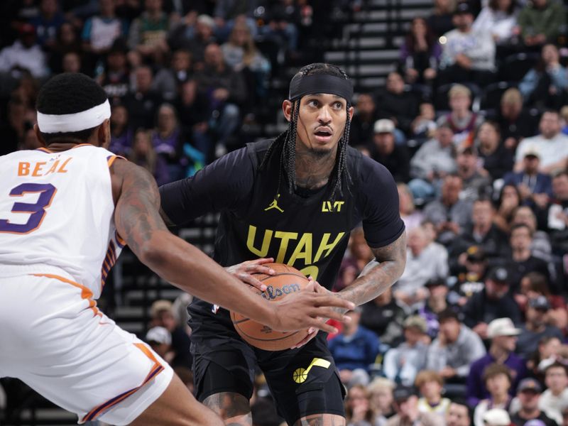 SALT LAKE CITY, UT - NOVEMBER 12: Jordan Clarkson #00 of the Utah Jazz looks to pass the ball during the game against the Phoenix Suns during the Emirates NBA Cup game on November 12, 2024 at vivint.SmartHome Arena in Salt Lake City, Utah. NOTE TO USER: User expressly acknowledges and agrees that, by downloading and or using this Photograph, User is consenting to the terms and conditions of the Getty Images License Agreement. Mandatory Copyright Notice: Copyright 2024NBAE (Photo by Melissa Majchrzak/NBAE via Getty Images)