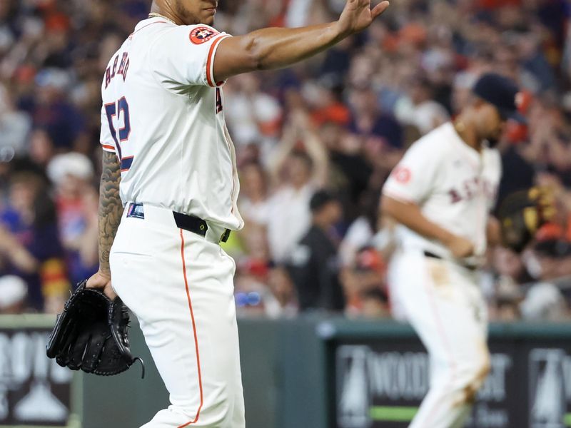 Apr 13, 2024; Houston, Texas, USA;  Houston Astros pitcher Bryan Abreu (52) reacts after getting out of the seventh inning with the bases loaded against the Texas Rangers at Minute Maid Park. Mandatory Credit: Thomas Shea-USA TODAY Sports