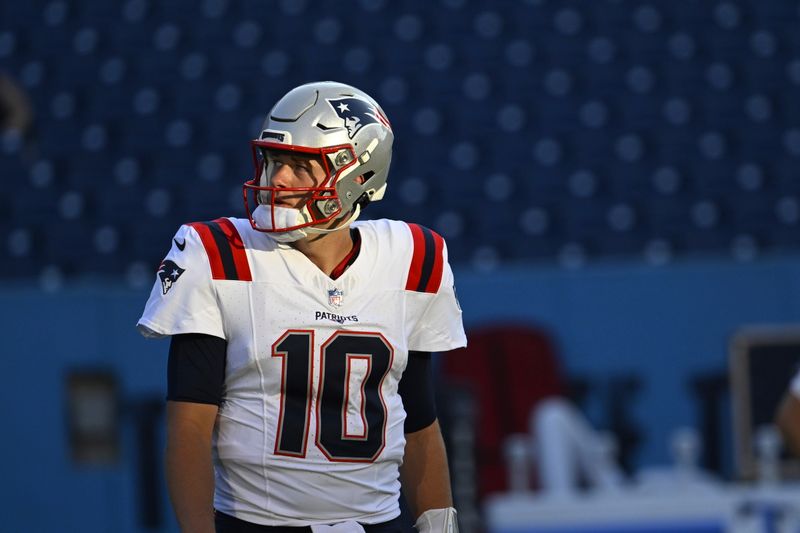 New England Patriots quarterback Mac Jones (10) warms up before an NFL preseason football game against the Tennessee Titans Friday, Aug. 25, 2023, in Nashville, Tenn. (AP Photo/John Amis)