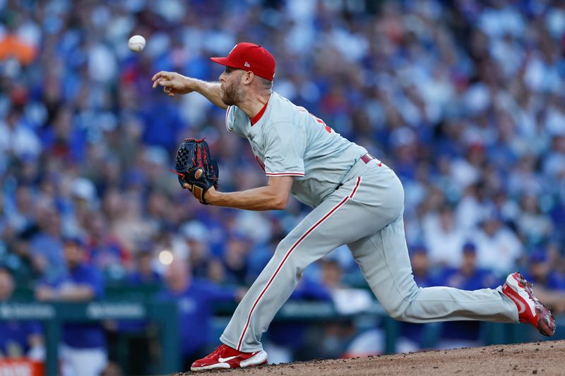 Jul 3, 2024; Chicago, Illinois, USA; Philadelphia Phillies starting pitcher Zack Wheeler (45) delivers a pitch against the Chicago Cubs during the first inning at Wrigley Field. Mandatory Credit: Kamil Krzaczynski-USA TODAY Sports