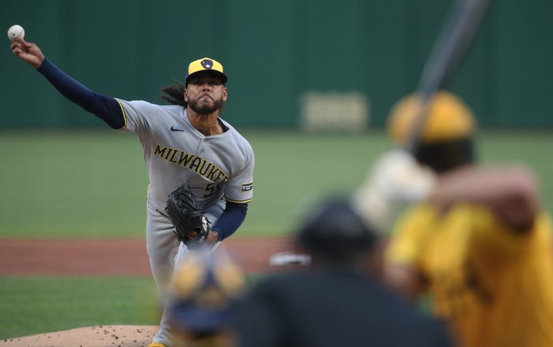 May 23, 2025; Pittsburgh, Pennsylvania, USA;  Milwaukee Brewers starting pitcher Freddy Peralta (51) delivers a pitch to Pittsburgh Pirates right fielder Bryan Reynolds (10) during the first inning at PNC Park. Mandatory Credit: Charles LeClaire-Imagn Images