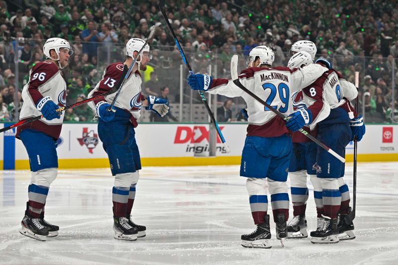 May 7, 2024; Dallas, Texas, USA; Colorado Avalanche right wing Mikko Rantanen (96) and right wing Valeri Nichushkin (13) and center Nathan MacKinnon (29) and defenseman Cale Makar (8) celebrates the game tying goal scored by MacKinnon against the Dallas Stars during the third period in game one of the second round of the 2024 Stanley Cup Playoffs at American Airlines Center. Mandatory Credit: Jerome Miron-USA TODAY Sports