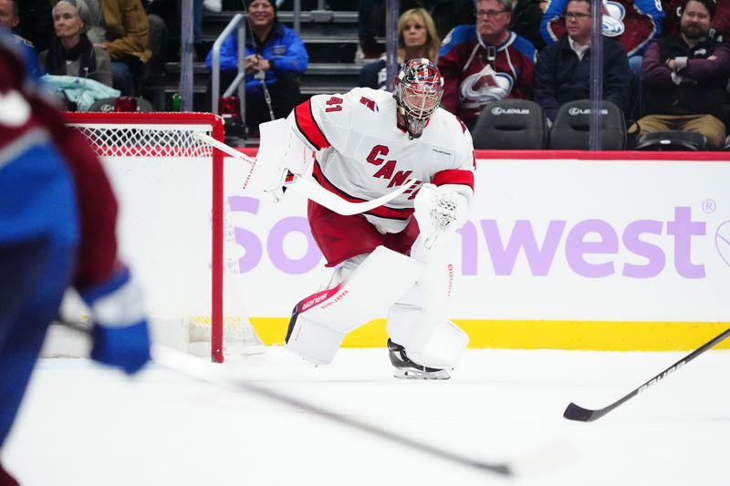 Nov 9, 2024; Denver, Colorado, USA; Carolina Hurricanes goaltender Spencer Martin (41) is pulled in the third period against the Colorado Avalanche at Ball Arena. Mandatory Credit: Ron Chenoy-Imagn Images