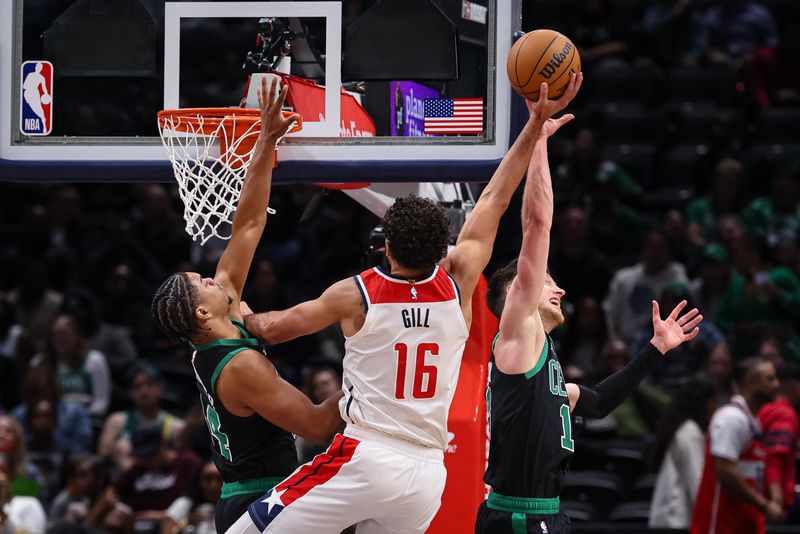 WASHINGTON, DC - OCTOBER 24: Drew Peterson #13 of the Boston Celtics blacks the shot of Anthony Gill #16 of the Washington Wizards during the second half at Capital One Arena on October 24, 2024 in Washington, DC. NOTE TO USER: User expressly acknowledges and agrees that, by downloading and or using this photograph, User is consenting to the terms and conditions of the Getty Images License Agreement. (Photo by Scott Taetsch/Getty Images)