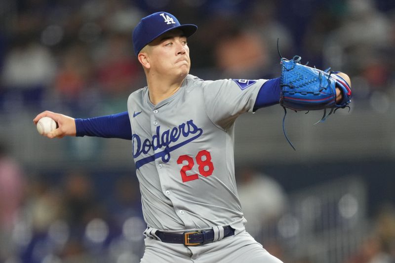 Sep 17, 2024; Miami, Florida, USA;  Los Angeles Dodgers starting pitcher Bobby Miller (28) pitches against the Miami Marlins in the first inning at loanDepot Park. Mandatory Credit: Jim Rassol-Imagn Images