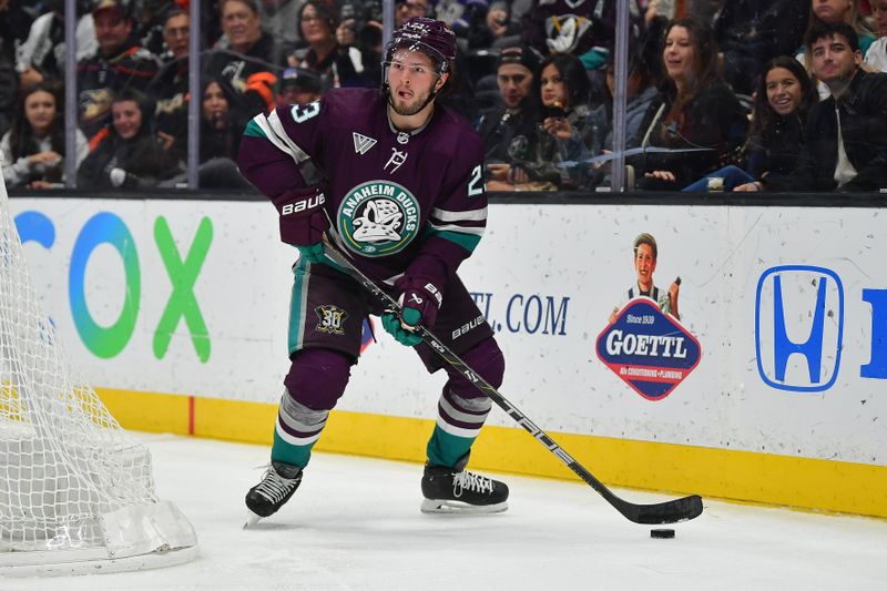 Nov 24, 2023; Anaheim, California, USA; Anaheim Ducks center Mason McTavish (23) controls the puck against the Los Angeles Kings during the second period at Honda Center. Mandatory Credit: Gary A. Vasquez-USA TODAY Sports