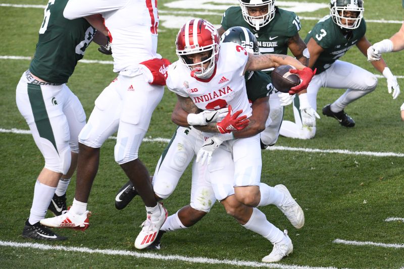 Nov 14, 2020; East Lansing, Michigan, USA; Indiana Hoosiers wide receiver Ty Fryfogle (3) runs for a touchdown as Michigan State Spartans cornerback Shakur Brown (29) attempts to tackle during the first quarter at Spartan Stadium. Mandatory Credit: Tim Fuller-USA TODAY Sports