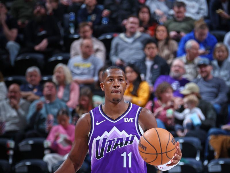 SALT LAKE CITY, UT - JANUARY 1: Kris Dunn #11 of the Utah Jazz dribbles the ball during the game against the Detroit Pistons on January 1, 2024 at vivint.SmartHome Arena in Salt Lake City, Utah. NOTE TO USER: User expressly acknowledges and agrees that, by downloading and or using this Photograph, User is consenting to the terms and conditions of the Getty Images License Agreement. Mandatory Copyright Notice: Copyright 2023 NBAE (Photo by Melissa Majchrzak/NBAE via Getty Images)