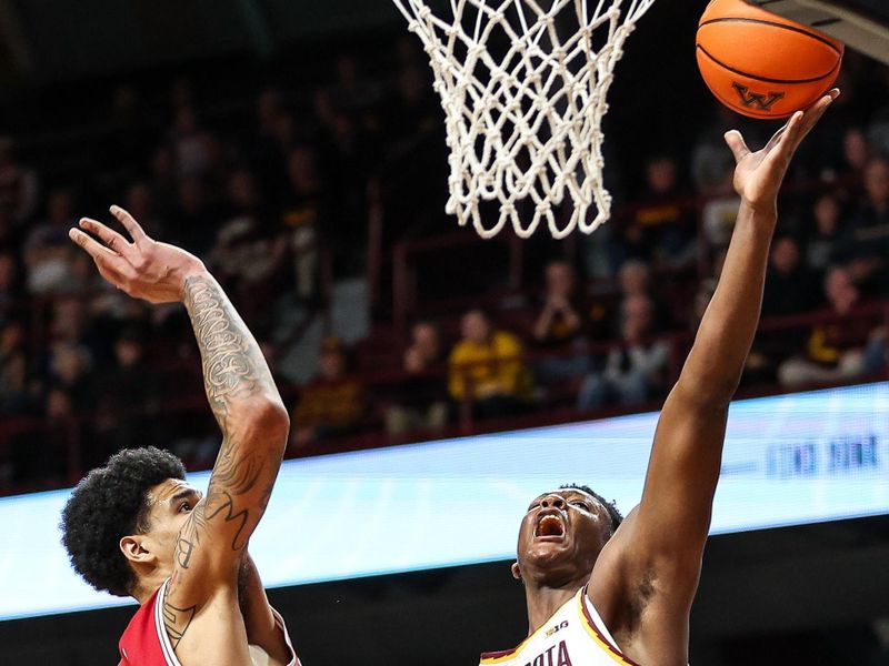 Mar 6, 2024; Minneapolis, Minnesota, USA; Minnesota Golden Gophers forward Pharrel Payne (21) shoots as Indiana Hoosiers center Kel'el Ware (1) defends during the first half at Williams Arena. Mandatory Credit: Matt Krohn-USA TODAY Sports