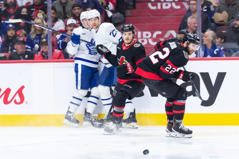 May 1, 2025; Ottawa, Ontario, CAN;  Ottawa Senators right wing Michael Amadio (22) and center Ridly Greig (71) follow the puck as Toronto Maple Leafs right wing Mitch Marner (16) and defenseman Brandon Carlo (25) look on in game six of the first round of the 2025 Stanley Cup Playoffs at Canadian Tire Centre. Mandatory Credit: Marc DesRosiers-Imagn Images