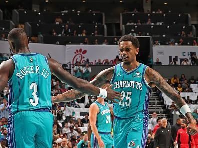CHARLOTTE, NC - OCTOBER 25: P.J. Washington #25 and Terry Rozier #3 of the Charlotte Hornets high five during the game against the Atlanta Hawks on October 25, 2023 at Spectrum Center in Charlotte, North Carolina. NOTE TO USER: User expressly acknowledges and agrees that, by downloading and or using this photograph, User is consenting to the terms and conditions of the Getty Images License Agreement. Mandatory Copyright Notice: Copyright 2023 NBAE (Photo by Kent Smith/NBAE via Getty Images)