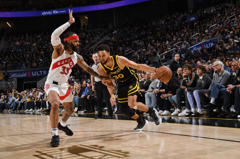 SAN FRANCISCO, CA - JANUARY 7: Stephen Curry #30 of the Golden State Warriors dribbles the ball during the game against the Toronto Raptors on January 7, 2024 at Chase Center in San Francisco, California. NOTE TO USER: User expressly acknowledges and agrees that, by downloading and or using this photograph, user is consenting to the terms and conditions of Getty Images License Agreement. Mandatory Copyright Notice: Copyright 2024 NBAE (Photo by Noah Graham/NBAE via Getty Images)