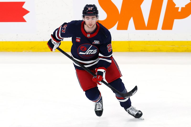 Mar 14, 2026; Winnipeg, Manitoba, CAN; Winnipeg Jets right wing Isak Rosen (27) warms up before a game against the Colorado Avalanche at Canada Life Centre. Mandatory Credit: James Carey Lauder-Imagn Images Mar 14, 2026; Winnipeg, Manitoba, CAN; Winnipeg Jets right wing Isak Rosen (27) warms up before a game against the Colorado Avalanche at Canada Life Centre. Mandatory Credit: James Carey Lauder-Imagn Images