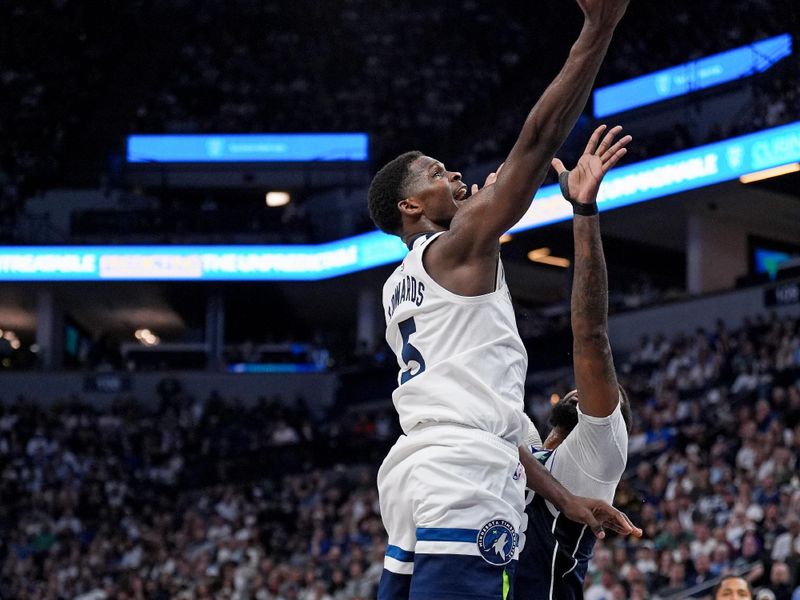 MINNEAPOLIS, MN -  OCTOBER 29: Anthony Edwards #5 of the Minnesota Timberwolves drives to the basket during the game against the Dallas Mavericks on October 29, 2024 at Target Center in Minneapolis, Minnesota. NOTE TO USER: User expressly acknowledges and agrees that, by downloading and or using this Photograph, user is consenting to the terms and conditions of the Getty Images License Agreement. Mandatory Copyright Notice: Copyright 2024 NBAE (Photo by Jordan Johnson/NBAE via Getty Images)