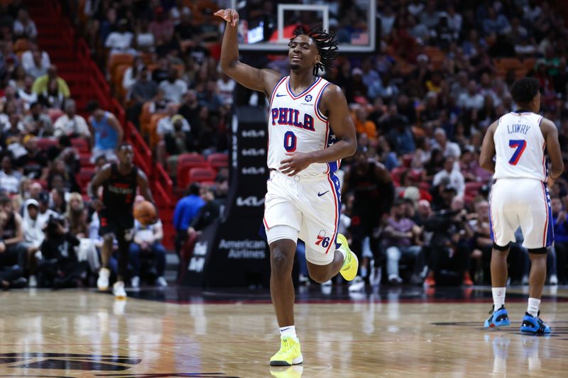 MIAMI, FLORIDA - APRIL 04: Tyrese Maxey #0 of the Philadelphia 76ers reacts after making a basket against the Miami Heat during the second quarter of the game at Kaseya Center on April 04, 2024 in Miami, Florida. NOTE TO USER: User expressly acknowledges and agrees that, by downloading and or using this photograph, User is consenting to the terms and conditions of the Getty Images License Agreement. (Photo by Megan Briggs/Getty Images)