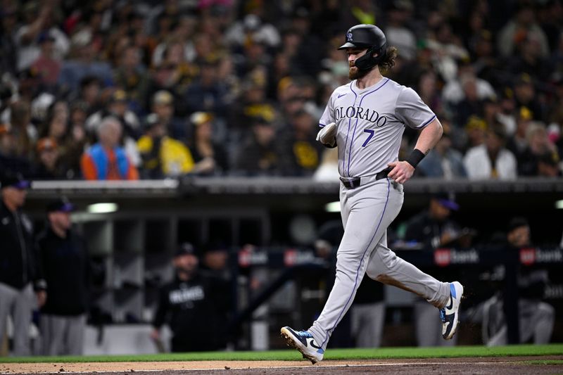 May 13, 2024; San Diego, California, USA; Colorado Rockies second baseman Brendan Rodgers (7) scores a run during the sixth inning against the San Diego Padres at Petco Park. Mandatory Credit: Orlando Ramirez-USA TODAY Sports