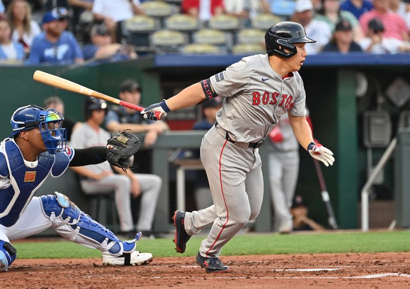 Aug 5, 2024; Kansas City, Missouri, USA;  Boston Red Sox designated hitter Masataka Yoshida (7) singles in the third inning against the Kansas City Royals at Kauffman Stadium. Mandatory Credit: Peter Aiken-USA TODAY Sports