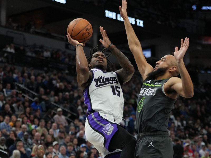 MINNEAPOLIS, MN -  MARCH 1: Davion Mitchell #15 of the Sacramento Kings drives to the basket during the game against the Minnesota Timberwolves on March 1, 2024 at Target Center in Minneapolis, Minnesota. NOTE TO USER: User expressly acknowledges and agrees that, by downloading and or using this Photograph, user is consenting to the terms and conditions of the Getty Images License Agreement. Mandatory Copyright Notice: Copyright 2024 NBAE (Photo by Jordan Johnson/NBAE via Getty Images)