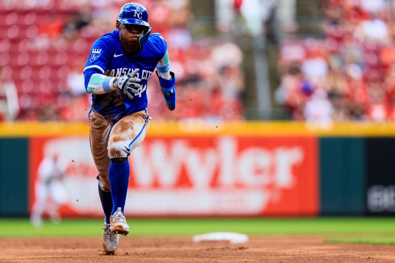 Aug 18, 2024; Cincinnati, Ohio, USA; Kansas City Royals outfielder Dairon Blanco (44) scores on a RBI single hit by designated hitter Vinnie Pasquantino (not pictured) in the third inning against the Cincinnati Reds at Great American Ball Park. Mandatory Credit: Katie Stratman-USA TODAY Sports