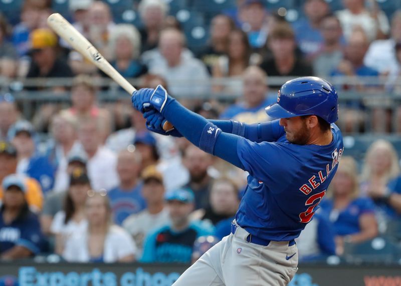 Aug 26, 2024; Pittsburgh, Pennsylvania, USA;  Chicago Cubs right fielder Cody Bellinger (24) hits an RBI double against the Pittsburgh Pirates during the third inning at PNC Park. Mandatory Credit: Charles LeClaire-USA TODAY Sports