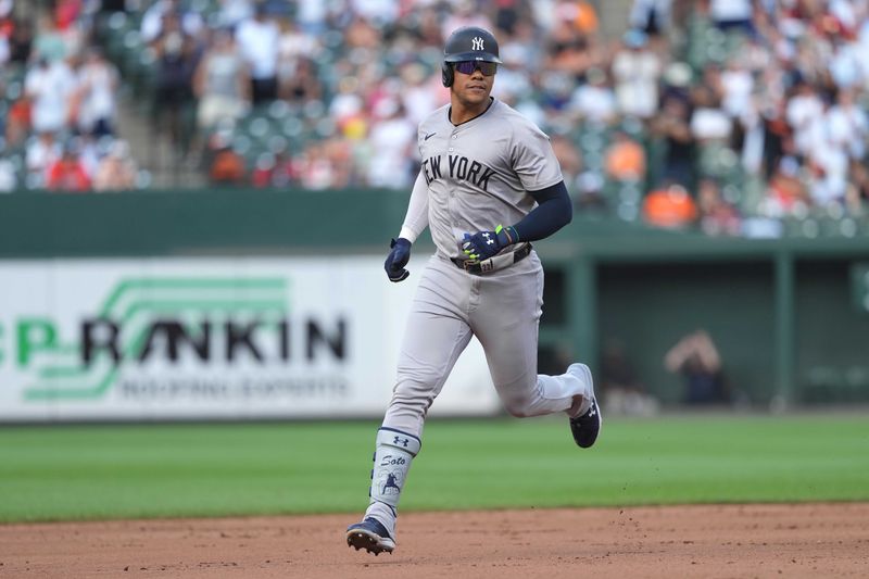 Jul 13, 2024; Baltimore, Maryland, USA; New York Yankees outfielder Juan Soto (22) rounds the bases following his solo home run in the fifth inning against the Baltimore Orioles at Oriole Park at Camden Yards. Mandatory Credit: Mitch Stringer-USA TODAY Sports