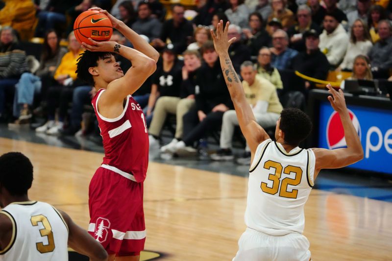 Feb 5, 2023; Boulder, Colorado, USA; Stanford Cardinal forward Spencer Jones (14) line up a shot over Colorado Buffaloes guard Nique Clifford (32) in the first half at the CU Events Center. Mandatory Credit: Ron Chenoy-USA TODAY Sports