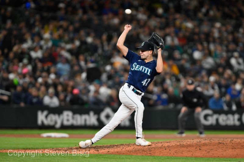 Sep 27, 2023; Seattle, Washington, USA; Seattle Mariners relief pitcher Matt Brash (47) avoids a hit ball during the seventh inning against the Houston Astros at T-Mobile Park. Mandatory Credit: Steven Bisig-USA TODAY Sports