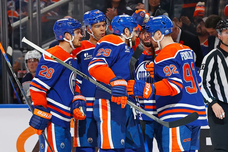 Nov 10, 2025; Edmonton, Alberta, CAN; The Edmonton Oilers celebrate a goal scored by defenseman Jake Wahlman (96) during the first period against the Columbus Blue Jackets at Rogers Place. Mandatory Credit: Perry Nelson-Imagn Images